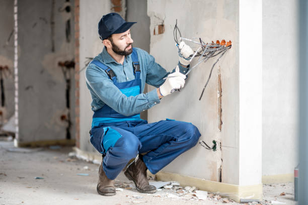 istock Electrician mounting wiring indoors 1069567872