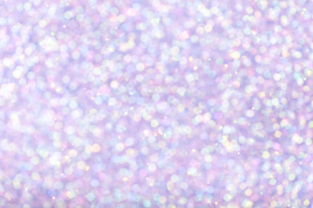 istock Blurred shiny lilac background with sparkling lights. 1069568374