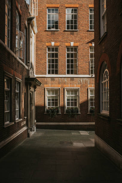 istock Classic english residential building with sunlight. 1069569586