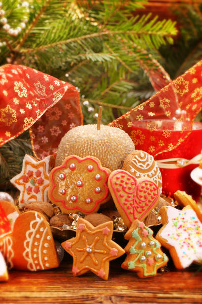 istock Christmas gingerbreads cookies on wooden table 1069579672