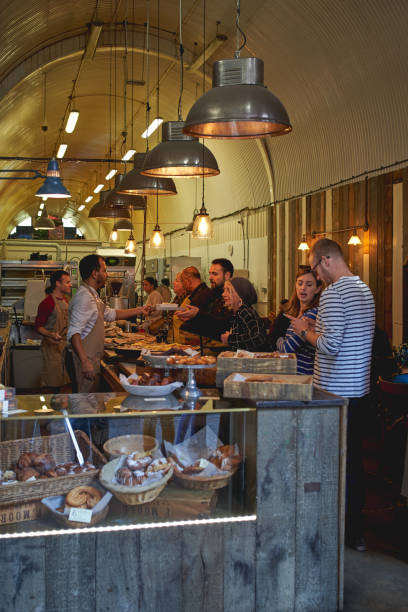 An artisan bakery in Maltby Street Market, London (UK). London, UK - November, 2018. An artisan bakery in Maltby Street Market, a gourmet street food market held in Bermondsey (South London) every weekend. bermondsey street restaurants stock pictures, royalty-free photos & images