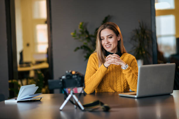 istock Successful casual businesswoman teaching online. 1069582462