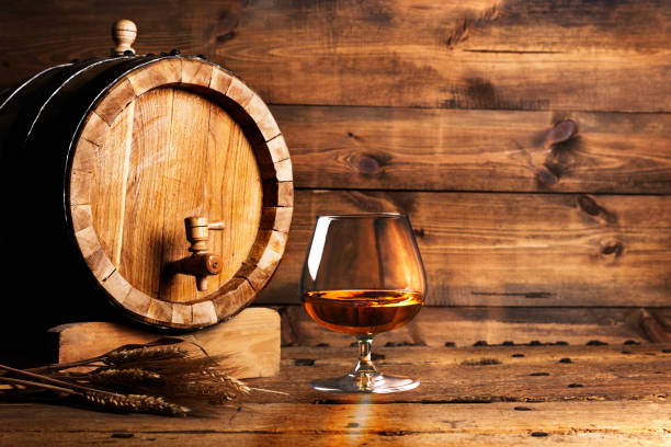 istock Brendy glass and old oak barrel 1069582934