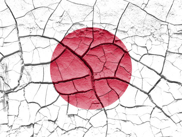 istock Japan flag cracked desert drought crisis background 1069586354