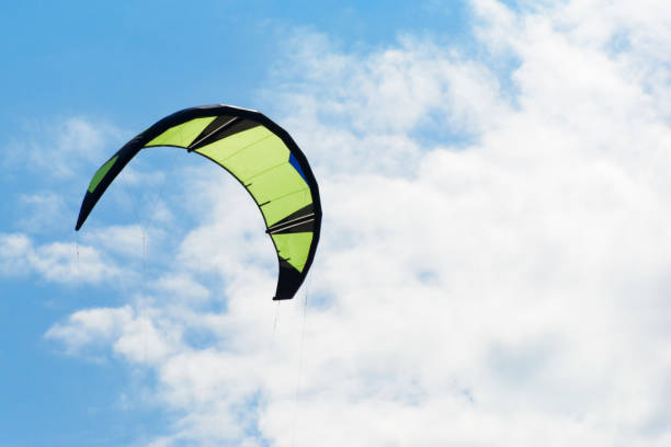 istock Kiteboarding kite close-up blue sky with clouds in background 1069588680