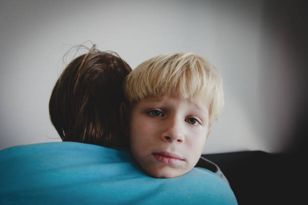 istock Father comforting sad stressed child, parenting, sorrow 1069594342
