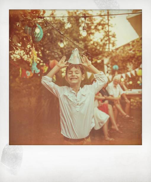 Smiling birthday boy Polaroid photo of smiling birthday boy birthday photos stock pictures, royalty-free photos & images