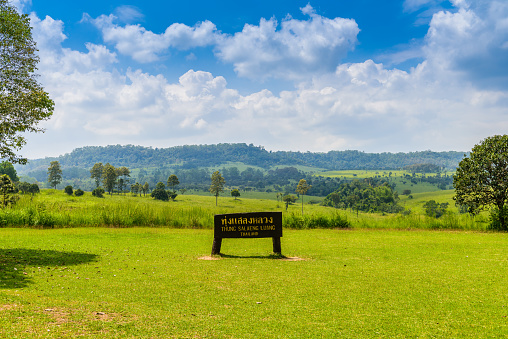 Nature background of landscape of Savanna Forest and mountain with a blue sky and white clouds in the spring afternoon at Thung Salaeng Luang National Park, Phetchaboon, Thailand