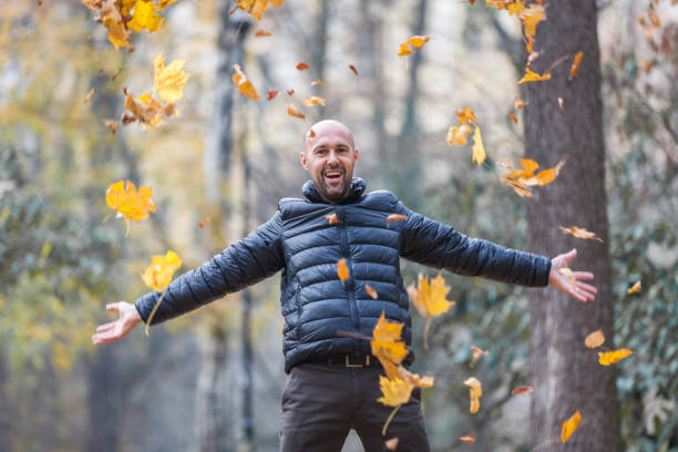 istock man in the park enjoying autumn 1069601126