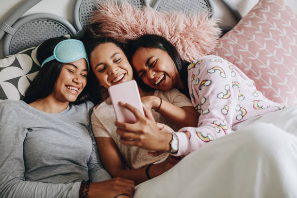 istock Girls having fun during a sleepover 1069612108