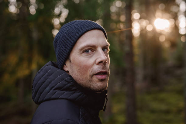 istock Man outdoors walking in autumn nature rural scene 1069617192