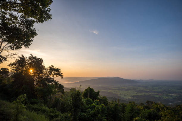 istock scenery during sunrise time with mountain and savannah field 1069617422