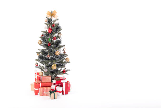 istock Decorated Christmas tree with gift wrapped presents isolated on a white background. 1069624356
