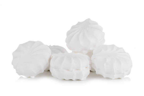 istock Sweet dessert group of white zephyr marshmallows isolated on white background, 1069635722