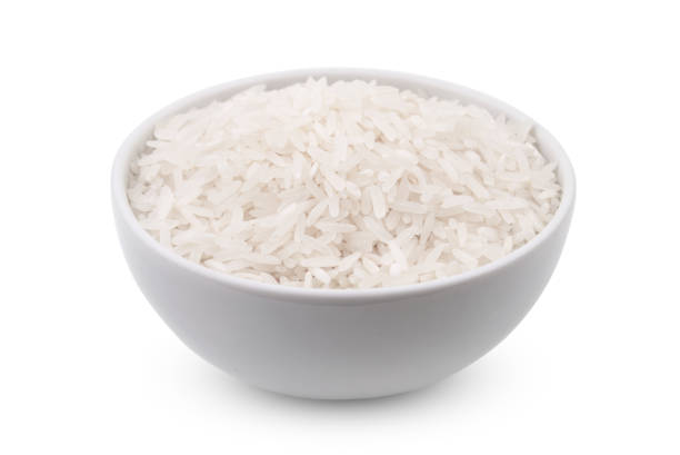 одна чаша с рисом изолированы на белом фоне - clipping path rice white rice basmati rice стоковые фото и изображения
