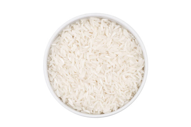 вид сверху одной чаши с рисом, изолированным на белом фоне - clipping path rice white rice basmati rice стоковые фото и изображения