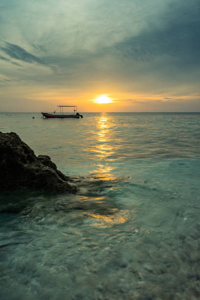 istock sunrise on the sea 1069639172