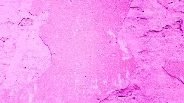 istock pink stone wall cement concrete surface grunge art abstract texture aged old rough structure background 1069647118