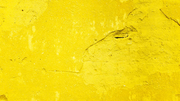 istock yellow stone wall cement concrete surface grunge art abstract texture aged old rough structure background 1069647246