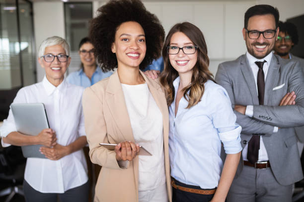 istock Group of successful business people in office 1069655646