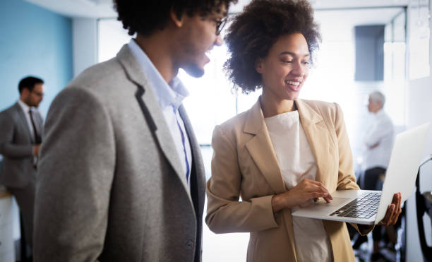 istock Group of successful business people at work in office 1069655778