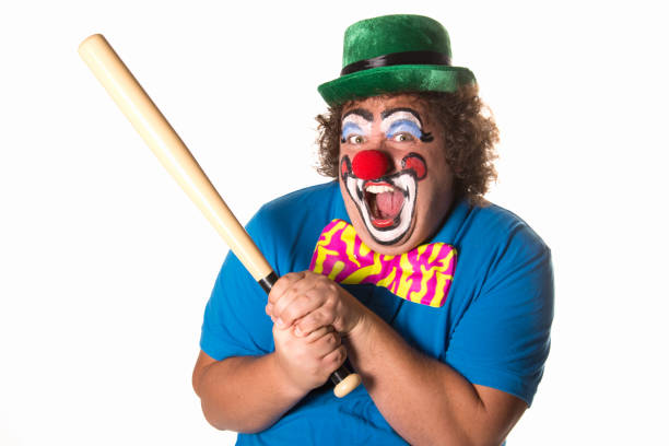 istock Dangerous clown. Funny fat man. 1069665320