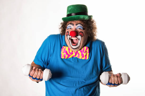 istock Funny clown and fitness. 1069665466