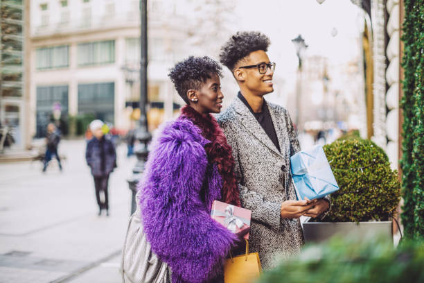 istock Young couple is buying Christmas presents 1069665540
