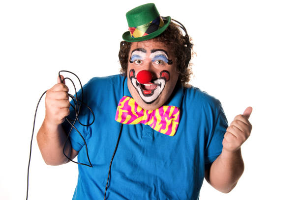 istock Funny clown listening to music 1069665554