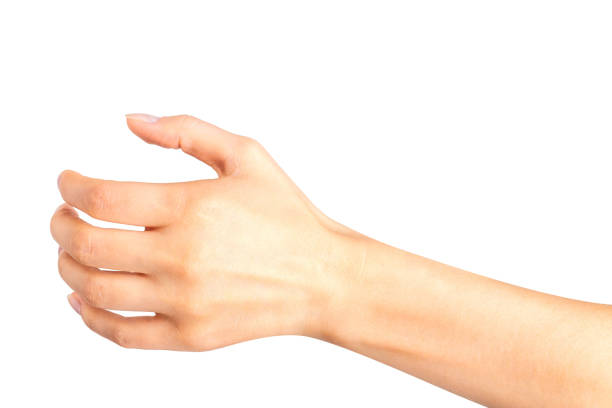 istock Woman hand holding something like a bottle or glass 1069668058