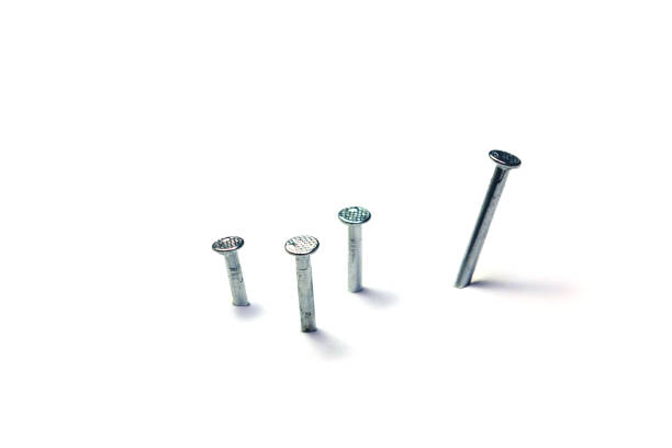 istock group of nails pegged on white  background isolated 1069668076