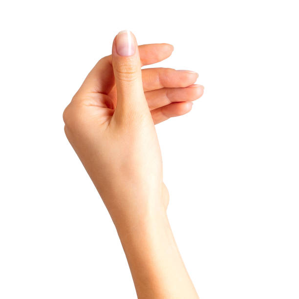 istock Woman hand holding something with two fingers 1069668082