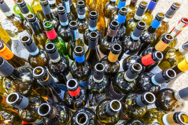 Photo of Empty wine bottles after a party