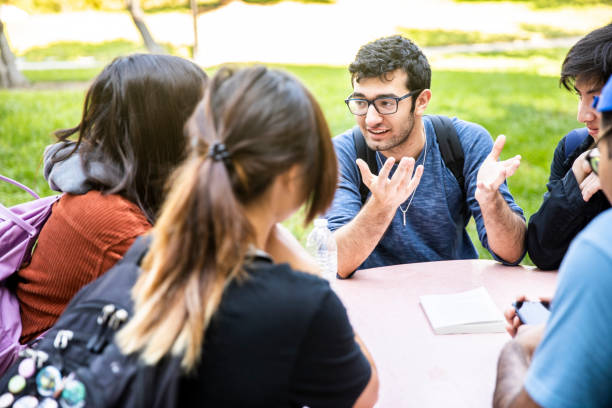 Group of Diverse College Students Around the Table