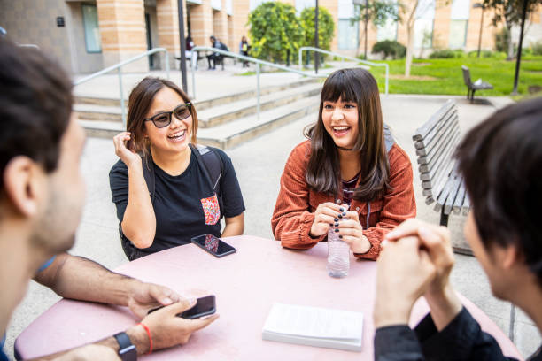 istock Group of Diverse College Students Around the Table 1069673742
