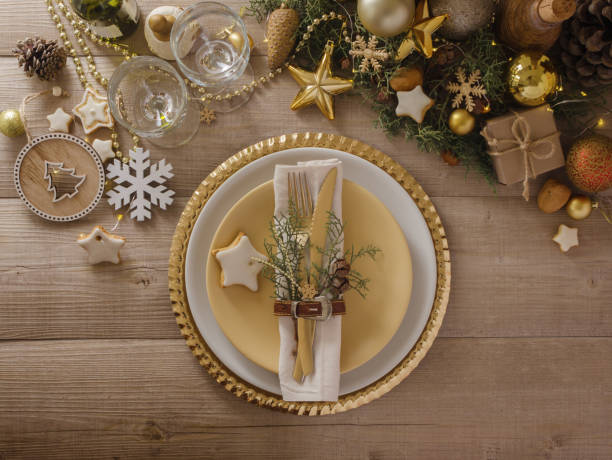 istock Christmas or New Year table setting.  Place setting for Christmas Dinner. Holiday Decorations. 1069673918