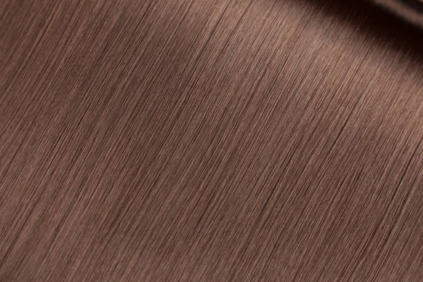 istock Closeup on luxurious glossy brown hair 1069675796