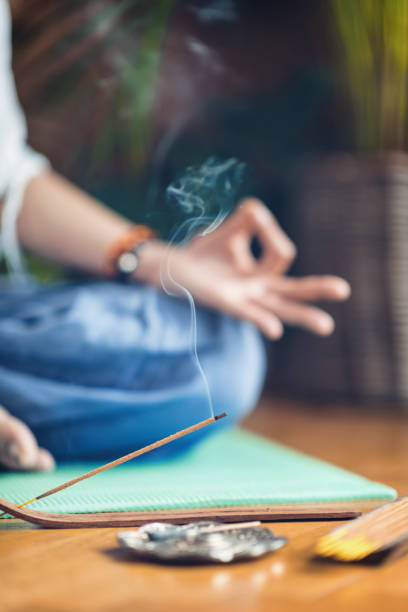 istock Meditation.  Woman Enjoying Incense Stick 1069678910