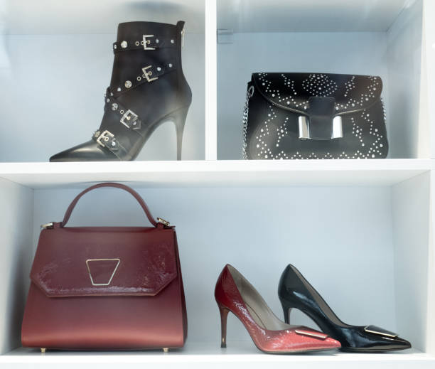 istock Woman Elegant High Heel Shoes in Store Display Window 1069681272