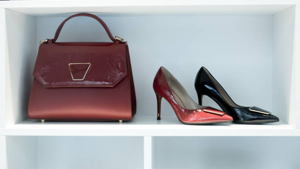 istock Woman Elegant High Heel Shoes in Store Display Window 1069681278