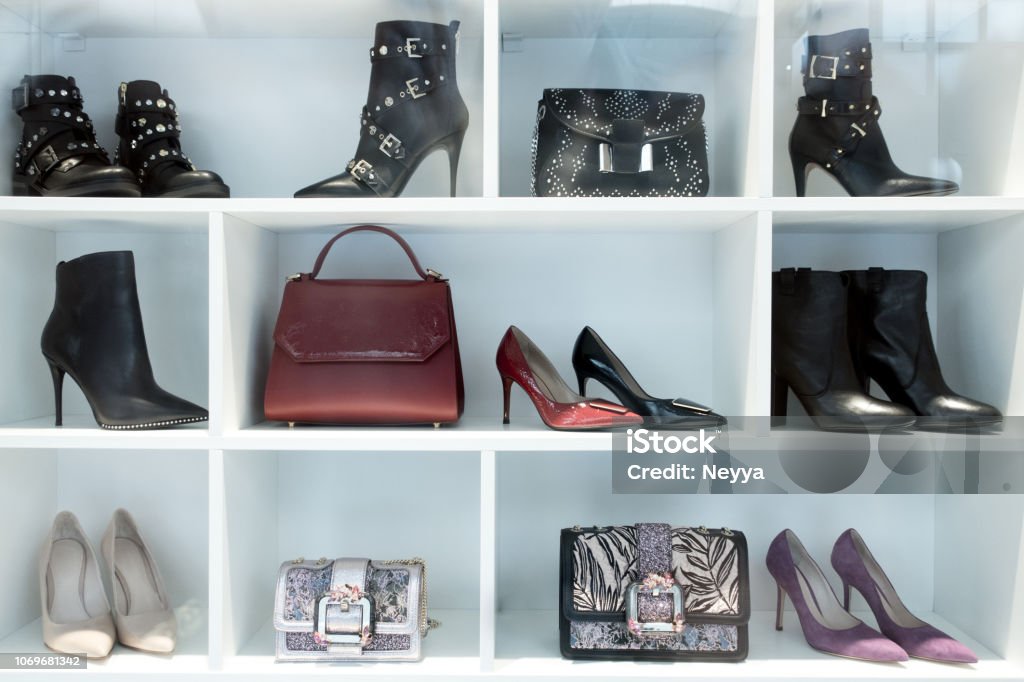 Woman Elegant High Heel Shoes in Store Display Window Luxury Stock Photo