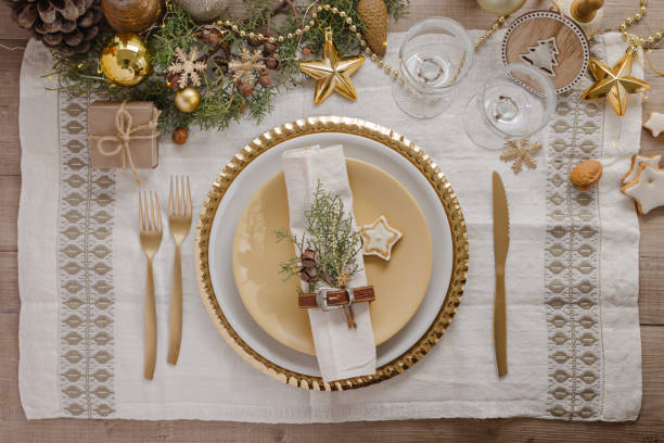 istock Christmas or New Year table setting.  Place setting for Christmas Dinner. Holiday Decorations. 1069681932