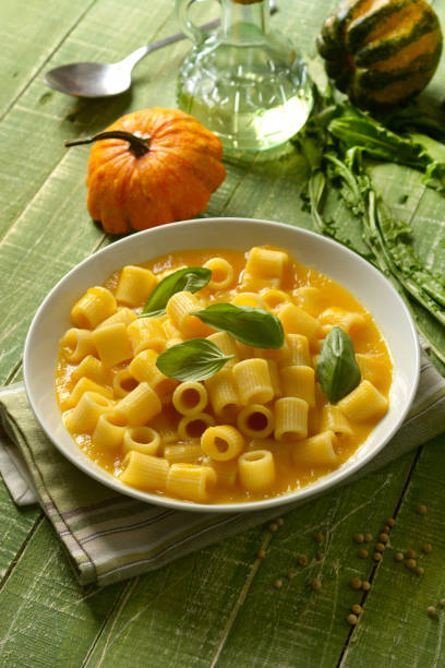 istock pumpkin soup with pasta - italian recipe - closeup 1069684368