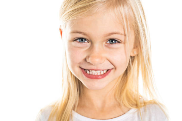 istock A Cute girl 5 year old posing in studio 1069692590