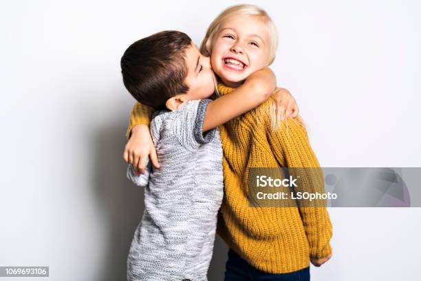 The Two Caucasian Siblings Brother And Sister Posing Stock Photo - Download Image Now
