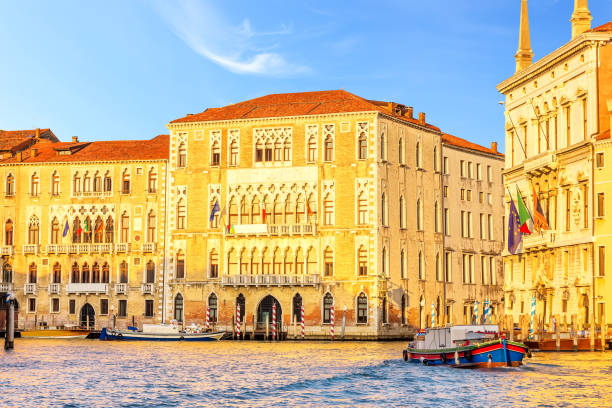 ca' foscari university of venice and palazzo balbi in grand canal - venice italy canal famous place grand canal imagens e fotografias de stock