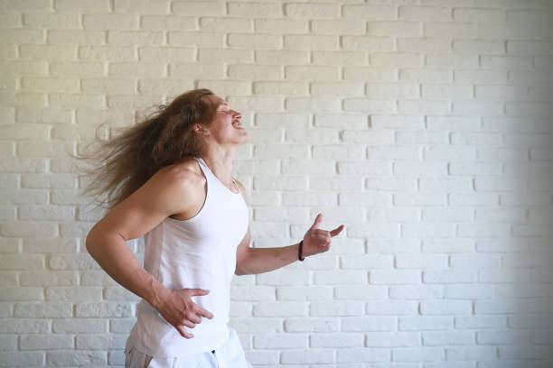 istock Young man with long hair 1069714358