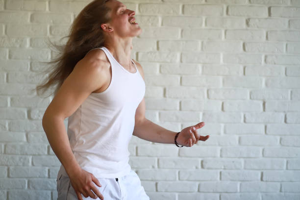 istock Young man with long hair 1069714460