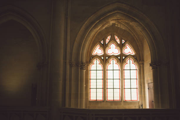 istock Low Angle View Of Glass Window In Church 1069717692