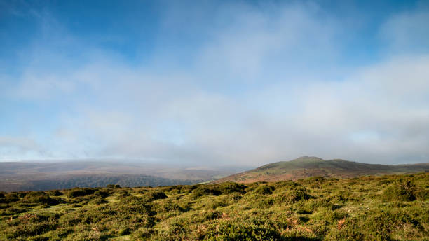 istock Stunning lansdcape view across Dartmoor during misty Autumnal morning 1069720992